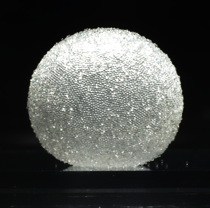 A bubble-shaped granular film, also named gas marble